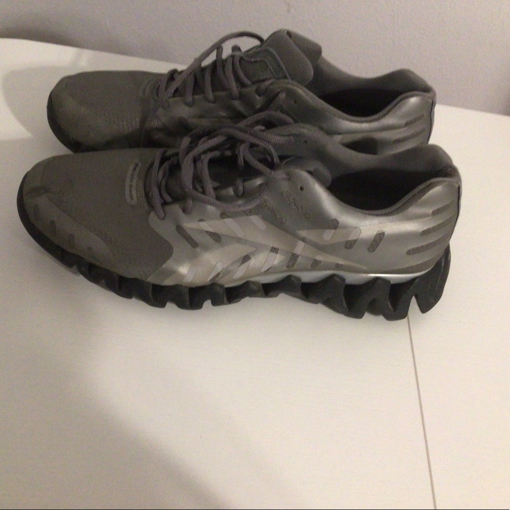 Mens size 13 Reebok Zig Tech Shark shoes. Grey, Silver and Black.